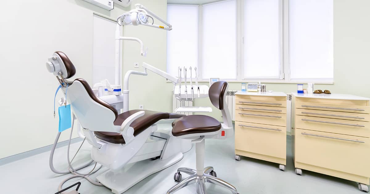 Empty dental office with dentist chair